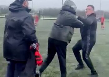 BREAKING: Raging parents who brawled on pitch at under-14s football match before being broken up by KIDS are banned for life