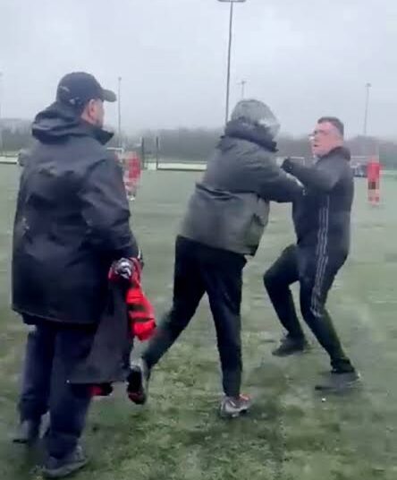 BREAKING: Raging parents who brawled on pitch at under-14s football match before being broken up by KIDS are banned for life